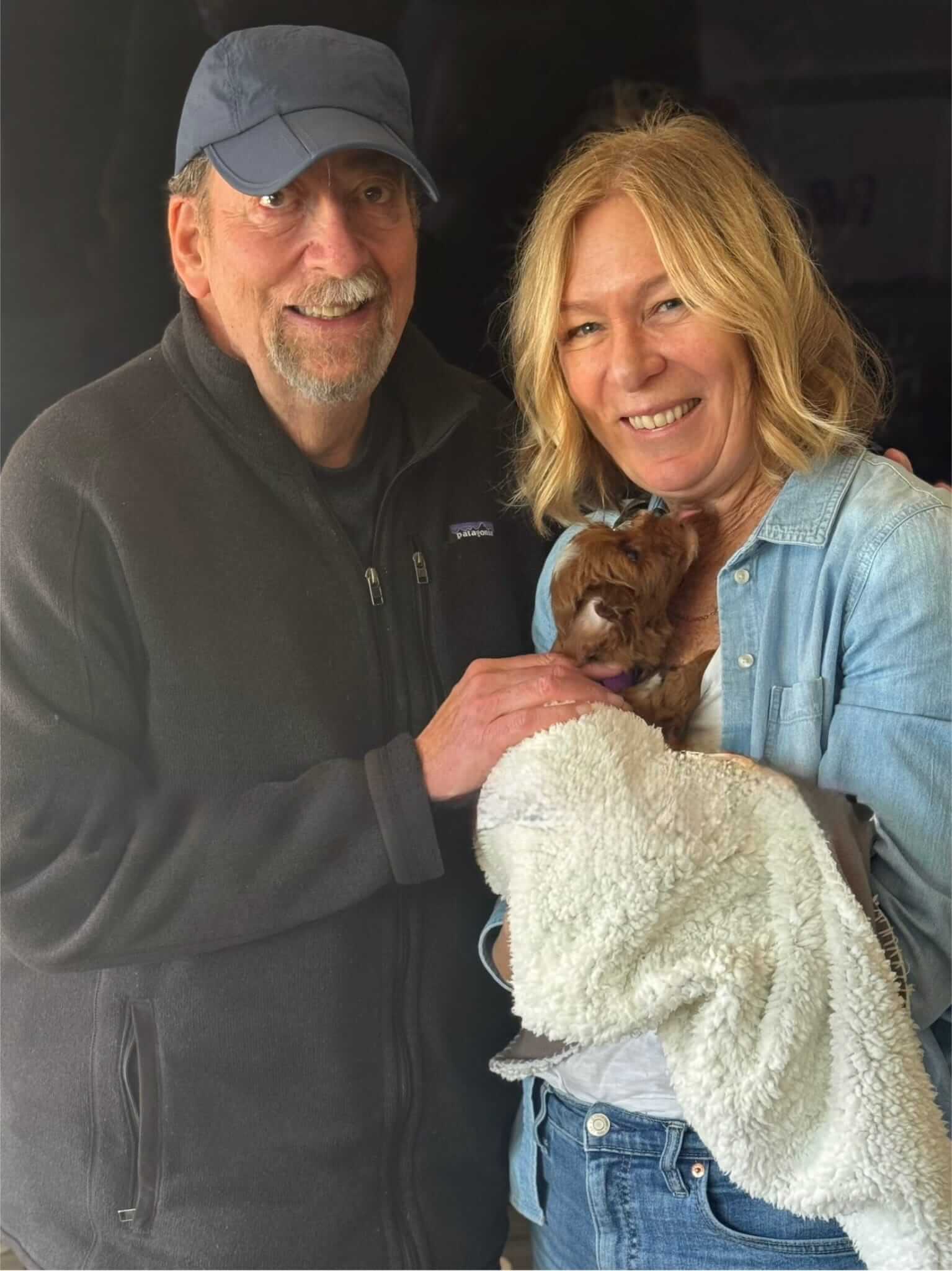 family adopting a toy poodle