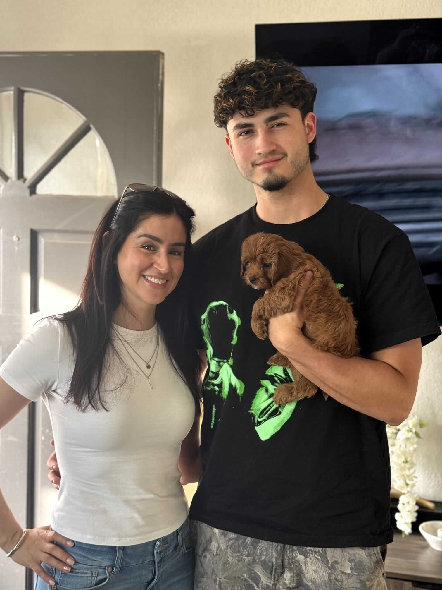 happy family with a toy poodle