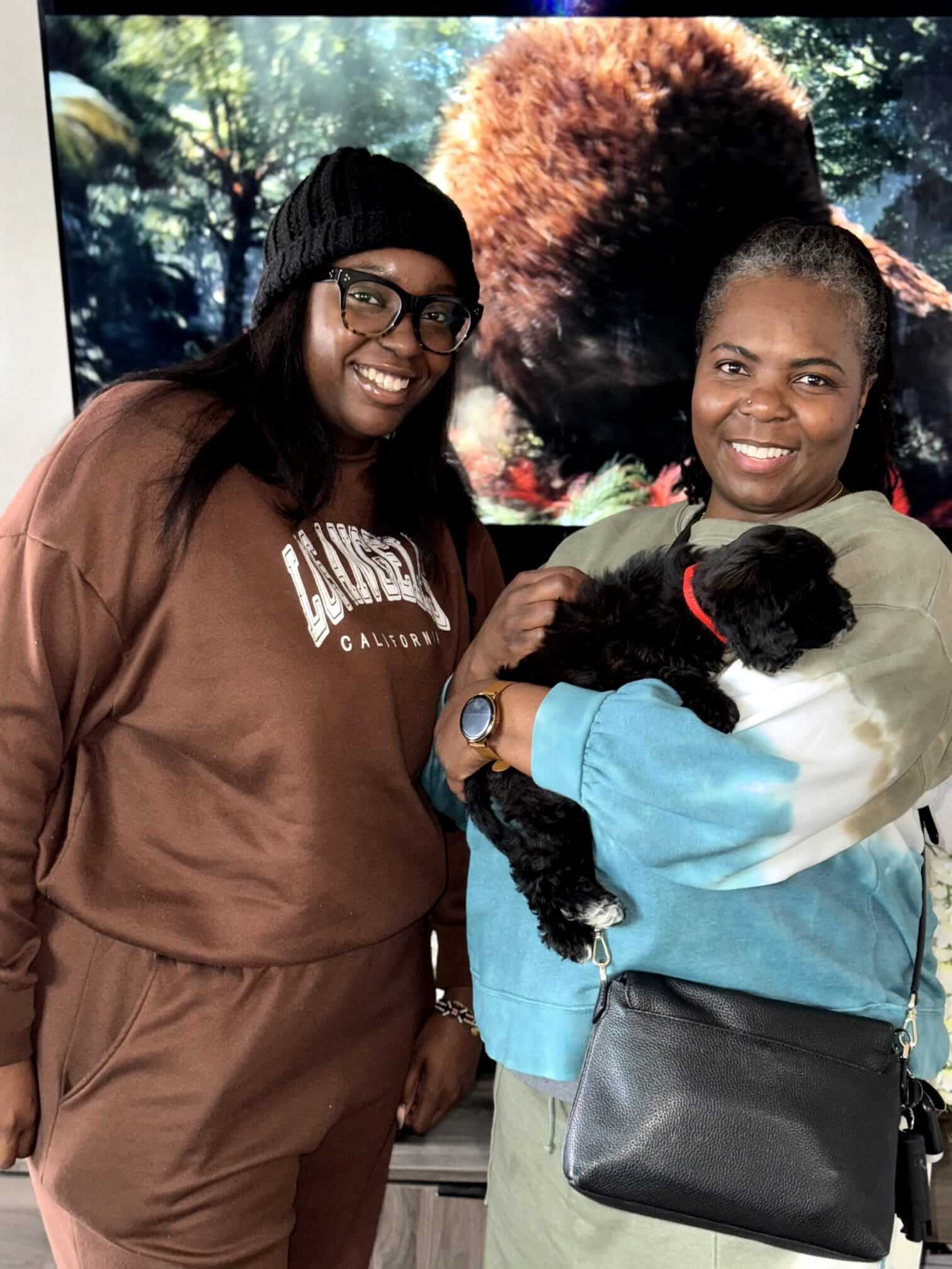 family happy with a toy poodle
